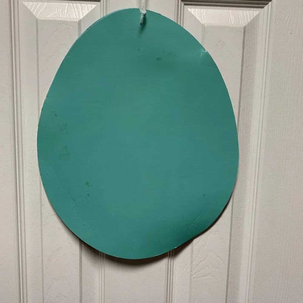 Happy Easter turquoise egg-shaped door sign